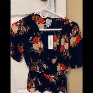NWT Francesca’s Peplum floral blouse